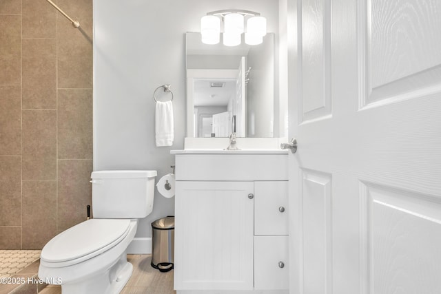 414 Yaupon Dr, Southport, NC 28461 - full bath with vanity, a tile shower, and toilet