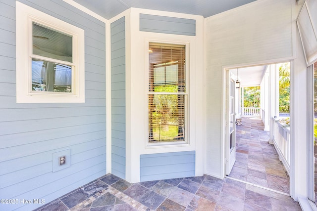 414 Yaupon Dr, Southport, NC 28461 - doorway to property featuring a porch