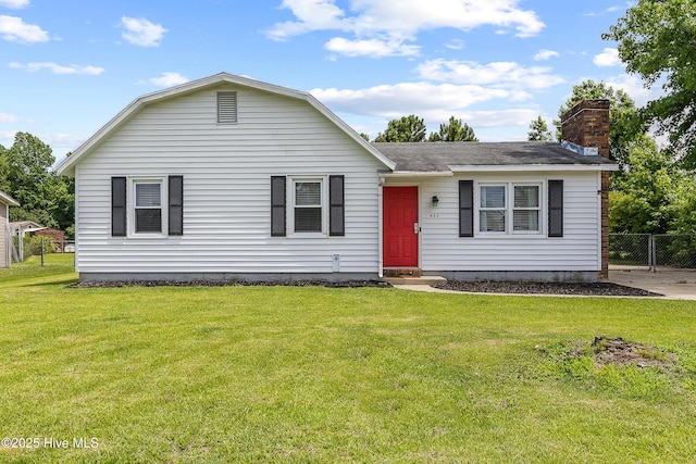 453 Hunting Green Dr, Jacksonville, NC 28546 - view of front of home with a chimney and a shingled roof