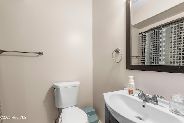 453 Hunting Green Dr, Jacksonville, NC 28546 - full bathroom featuring toilet and vanity