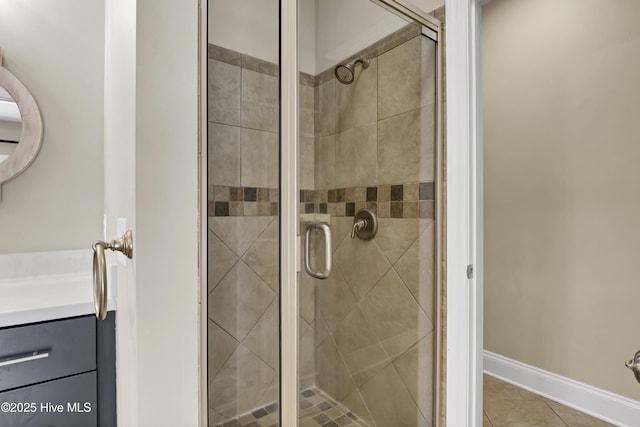 5622 Shell Road Village Dr, Wilmington, NC 28403 - bathroom with vanity, a shower stall, tile patterned floors, and baseboards
