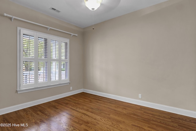 5622 Shell Road Village Dr, Wilmington, NC 28403 - empty room featuring baseboards, wood finished floors, and a ceiling fan