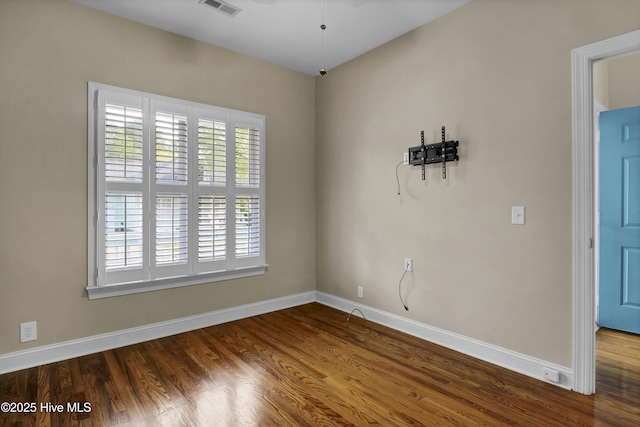 5622 Shell Road Village Dr, Wilmington, NC 28403 - unfurnished room featuring baseboards, wood finished floors, and a ceiling fan