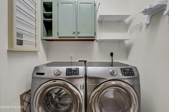 5622 Shell Road Village Dr, Wilmington, NC 28403 - laundry room featuring washing machine and dryer and cabinet space