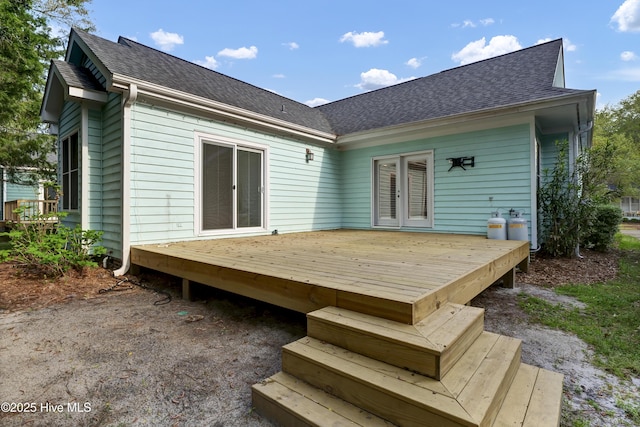 5622 Shell Road Village Dr, Wilmington, NC 28403 - rear view of house with a deck, a shingled roof, and french doors