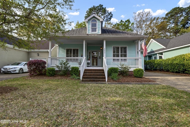 5622 Shell Road Village Dr, Wilmington, NC 28403 - view of front of house with covered porch, driveway, and a front lawn