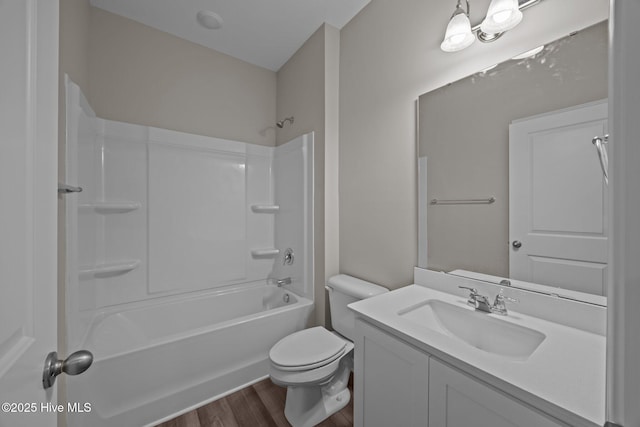 1008 Rodanthe Dr, New Bern, NC 28562 - bathroom featuring wood finished floors, vanity, toilet, and tub / shower combination