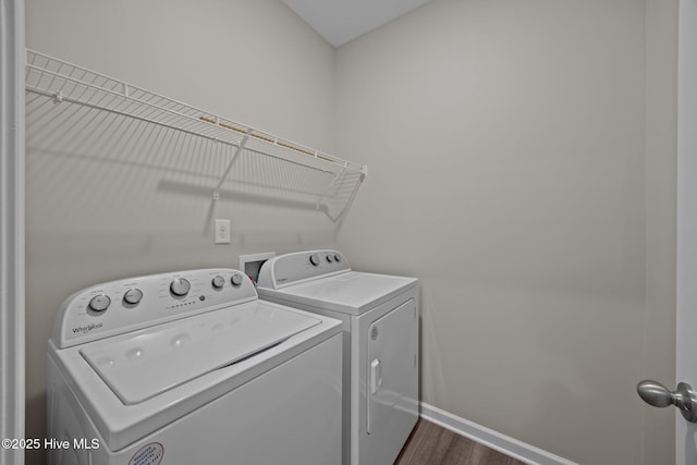 1008 Rodanthe Dr, New Bern, NC 28562 - washroom with washing machine and dryer, baseboards, and dark wood-style flooring