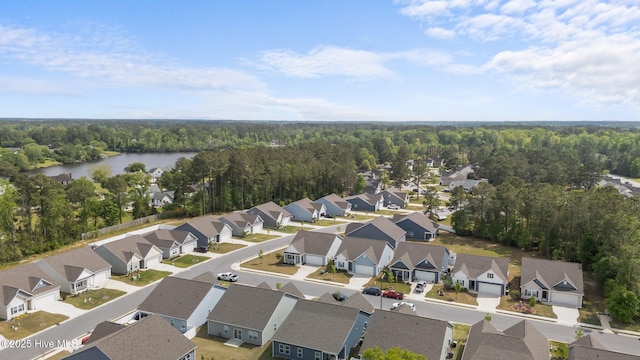 1008 Rodanthe Dr, New Bern, NC 28562 - aerial view of residential area featuring a forest and a large body of water