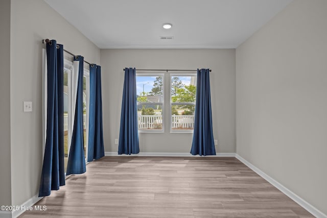 1008 Rodanthe Dr, New Bern, NC 28562 - unfurnished room with wood finished floors and baseboards