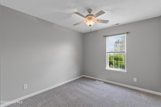 1001 Windgate Dr, Wilmington, NC 28412 - empty room with baseboards, carpet flooring, ceiling fan, and a textured ceiling