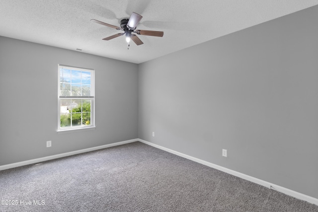 1001 Windgate Dr, Wilmington, NC 28412 - carpeted spare room featuring ceiling fan, a textured ceiling, and baseboards
