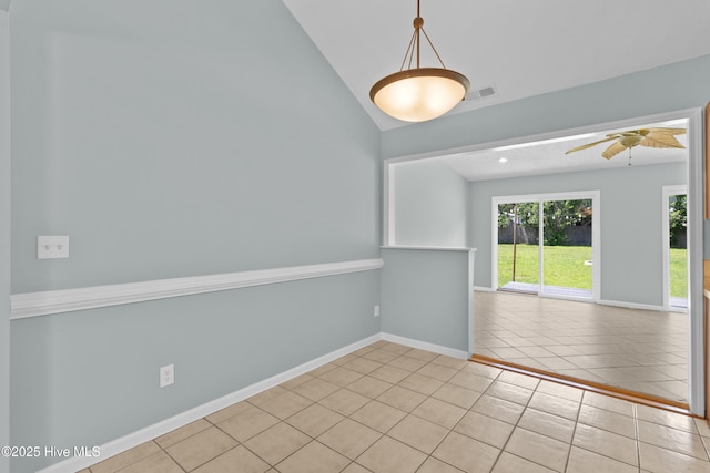 1001 Windgate Dr, Wilmington, NC 28412 - tiled empty room featuring ceiling fan, vaulted ceiling, and baseboards