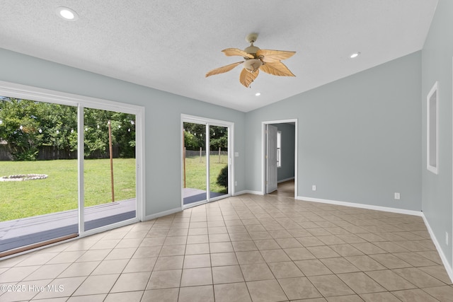 1001 Windgate Dr, Wilmington, NC 28412 - unfurnished room featuring ceiling fan, vaulted ceiling, baseboards, light tile patterned floors, and recessed lighting