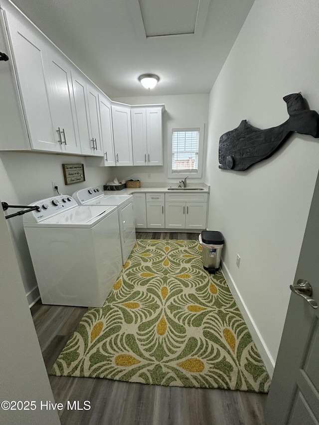429 Island Creek Rd, Rocky Point, NC 28457 - laundry room featuring wood finished floors, independent washer and dryer, cabinet space, attic access, and baseboards
