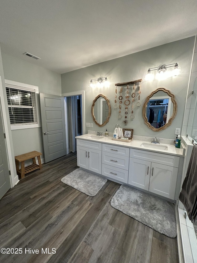 429 Island Creek Rd, Rocky Point, NC 28457 - bathroom with wood finished floors and double vanity