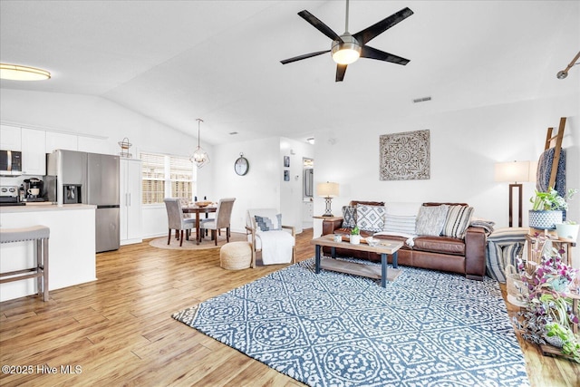 222 Bridgeton Ct, Wilmington, NC 28411 - living area featuring light wood-style flooring, vaulted ceiling, and a ceiling fan