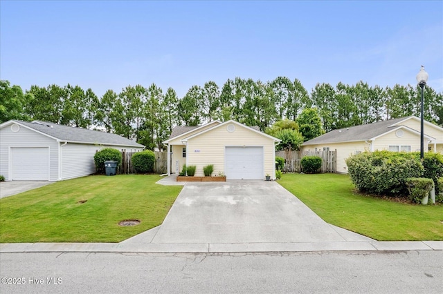 222 Bridgeton Ct, Wilmington, NC 28411 - view of front of home featuring a garage, an outbuilding, view of wooded area, and driveway