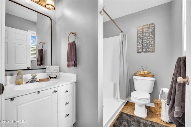 222 Bridgeton Ct, Wilmington, NC 28411 - bathroom with toilet, vanity, a shower with shower curtain, and stone finish flooring