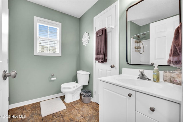 222 Bridgeton Ct, Wilmington, NC 28411 - full bathroom with baseboards, vanity, toilet, and a shower with shower curtain