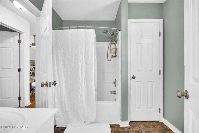 222 Bridgeton Ct, Wilmington, NC 28411 - bathroom with vanity, shower / bathtub combination with curtain, and baseboards