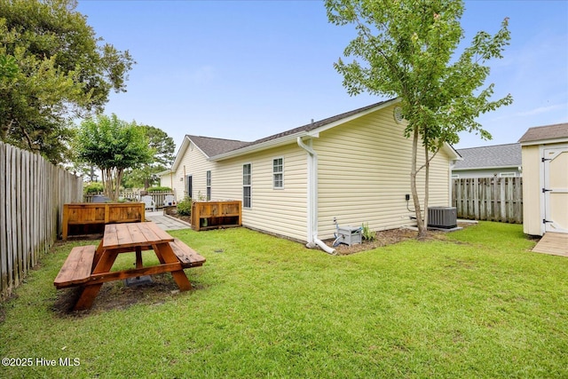 222 Bridgeton Ct, Wilmington, NC 28411 - back of property with central AC unit and a deck