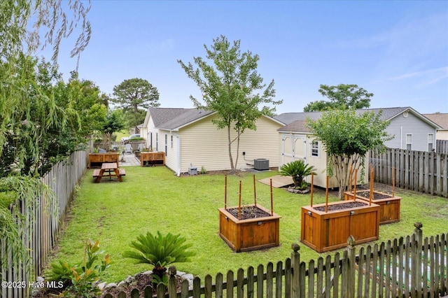222 Bridgeton Ct, Wilmington, NC 28411 - view of yard featuring a garden, a wooden deck, and central AC