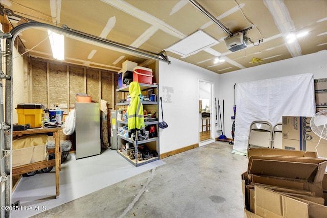 222 Bridgeton Ct, Wilmington, NC 28411 - garage with a garage door opener and electric water heater