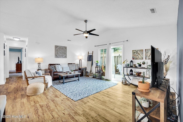 222 Bridgeton Ct, Wilmington, NC 28411 - living room with wood finished floors, vaulted ceiling, and a ceiling fan