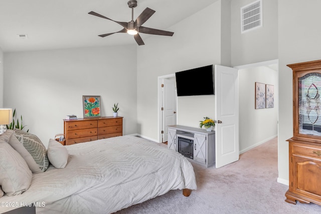 6751 Blacktip Ln, Wilmington, NC 28412 - bedroom featuring high vaulted ceiling, carpet, and ceiling fan