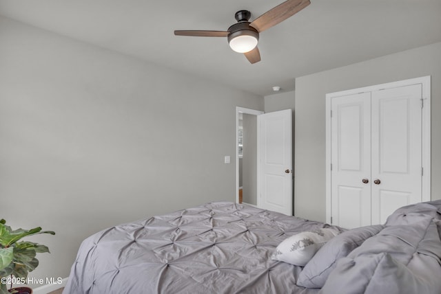 6751 Blacktip Ln, Wilmington, NC 28412 - bedroom with a ceiling fan and a closet