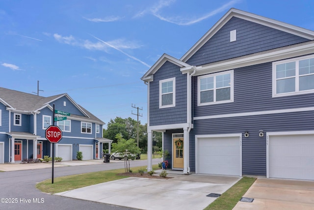 6751 Blacktip Ln, Wilmington, NC 28412 - view of front of house featuring a garage and driveway