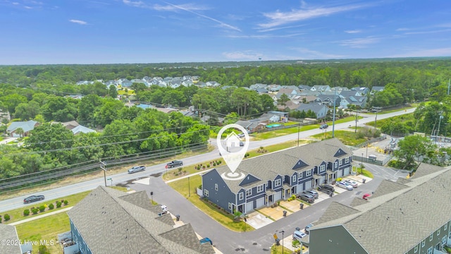 6751 Blacktip Ln, Wilmington, NC 28412 - aerial perspective of suburban area with a heavily wooded area