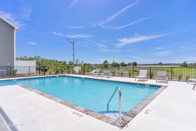 6751 Blacktip Ln, Wilmington, NC 28412 - community pool featuring a patio