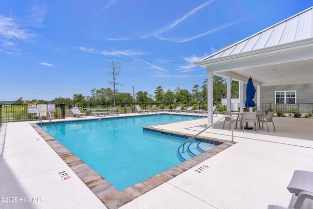 6751 Blacktip Ln, Wilmington, NC 28412 - community pool with a patio