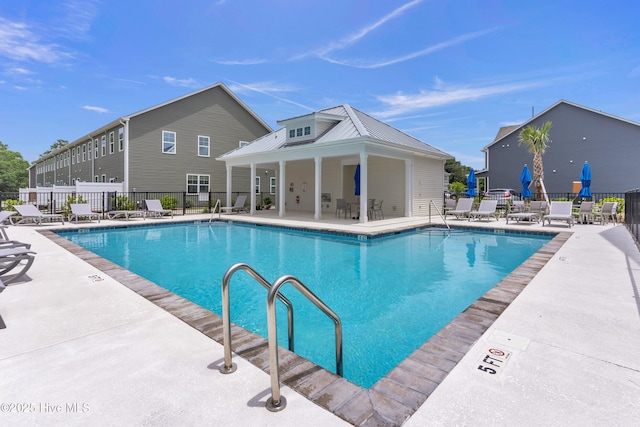 6751 Blacktip Ln, Wilmington, NC 28412 - community pool with a patio area