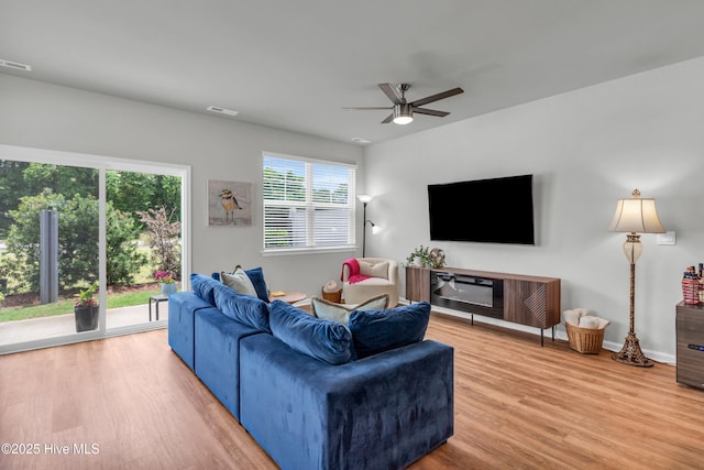 6751 Blacktip Ln, Wilmington, NC 28412 - living room with a ceiling fan and wood finished floors