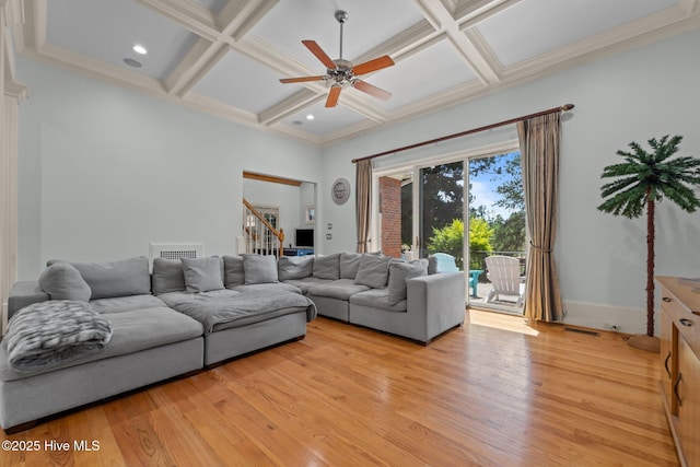 30 Spring Valley Ct, Pinehurst, NC 28374 - living room featuring coffered ceiling, a ceiling fan, light wood-type flooring, beamed ceiling, and stairs
