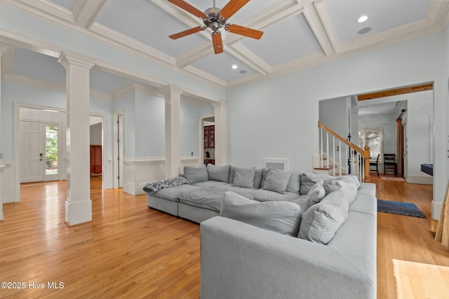 30 Spring Valley Ct, Pinehurst, NC 28374 - living area with ornate columns, ceiling fan, coffered ceiling, stairs, and light wood-type flooring