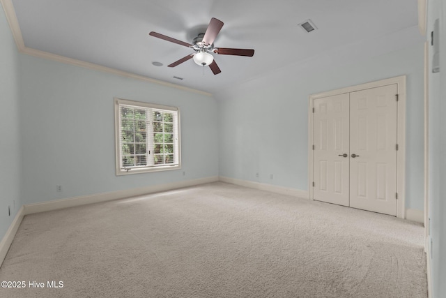 30 Spring Valley Ct, Pinehurst, NC 28374 - unfurnished bedroom with ornamental molding, carpet flooring, a closet, and a ceiling fan