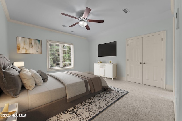 30 Spring Valley Ct, Pinehurst, NC 28374 - bedroom featuring light carpet, crown molding, a ceiling fan, and a closet