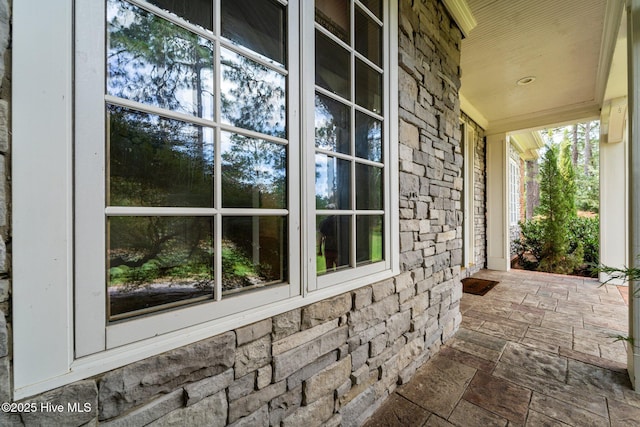 30 Spring Valley Ct, Pinehurst, NC 28374 - view of property exterior with stone siding and a porch