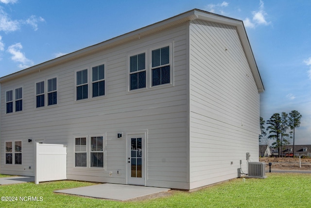 2125 Kali Ln Unit A, Greenville, NC 27834 - back of house featuring central AC unit, a patio area, and a lawn