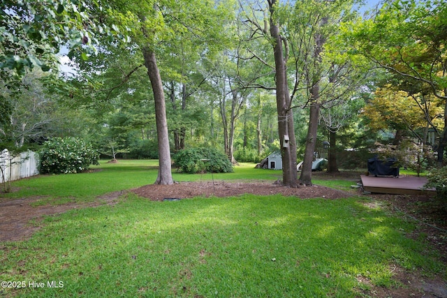 1505 Faulkenberry Rd, Wilmington, NC 28409 - view of yard with a wooden deck