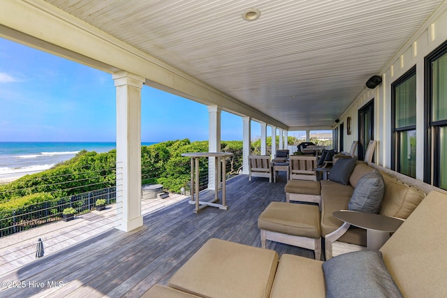 585 Forest Dunes Dr, Pine Knoll Shores, NC 28512 - wooden deck with a water view