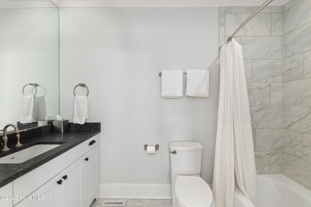 585 Forest Dunes Dr, Pine Knoll Shores, NC 28512 - full bathroom featuring vanity and shower / bath combo with shower curtain