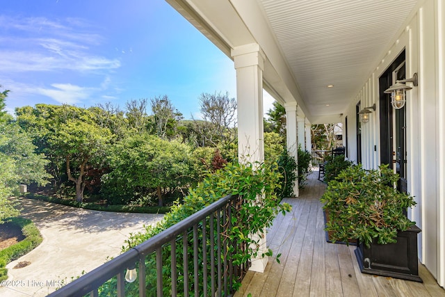 585 Forest Dunes Dr, Pine Knoll Shores, NC 28512 - view of wooden porch
