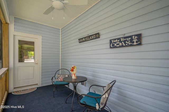 163 NE 31st St, Oak Island, NC 28465 - sunroom / solarium featuring a ceiling fan