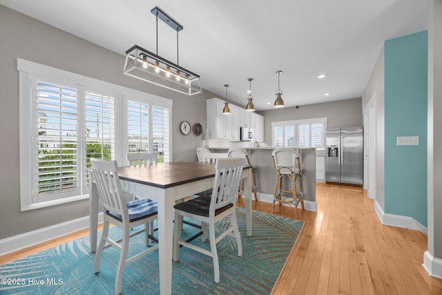 102 Seaside Ln, North Topsail Beach, NC 28460 - dining room with light wood-type flooring and recessed lighting