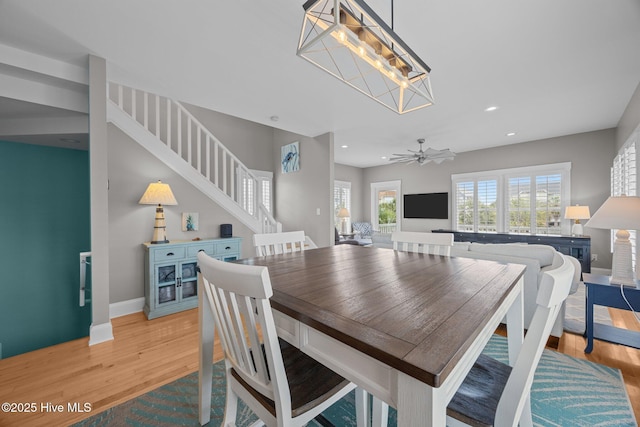 102 Seaside Ln, North Topsail Beach, NC 28460 - dining area with recessed lighting, stairway, and light wood-style floors